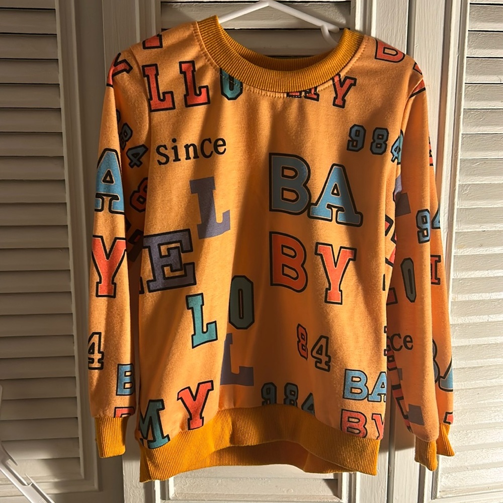 Letter printed long sleeves shirt used but in good condition true to size